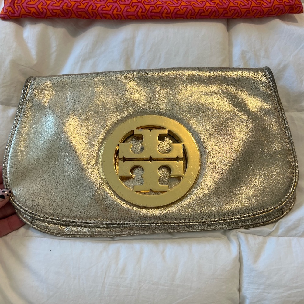 Tory Burch gold clutch